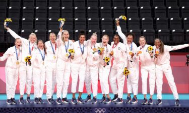 Players of Team United States react after receiving their Gold Medals during the Victory Ceremony following the Women's Gold Medal Volleyball match between Brazil and United States on day sixteen of the Tokyo 2020 Olympic Games