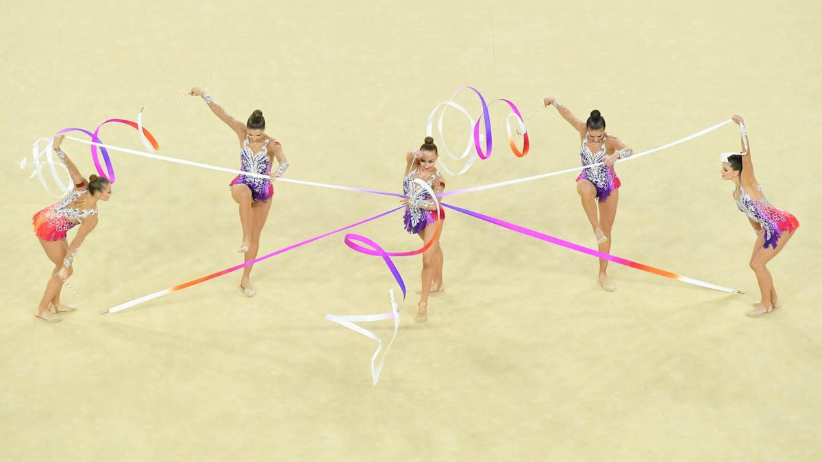 Rhythmic gymnasts group competes