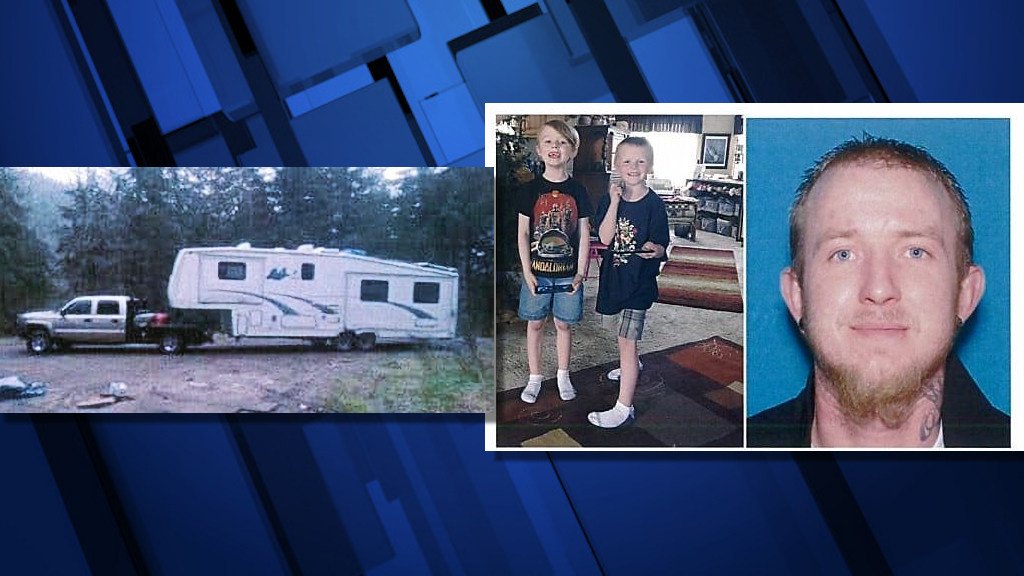 Carbon County, Utah officials released photo of Derek Rowley, AMBER alert subjects Arsen and Manson Rowley and gold Chevy Silverado flatbed pickup towing fifth-wheel trailer 
