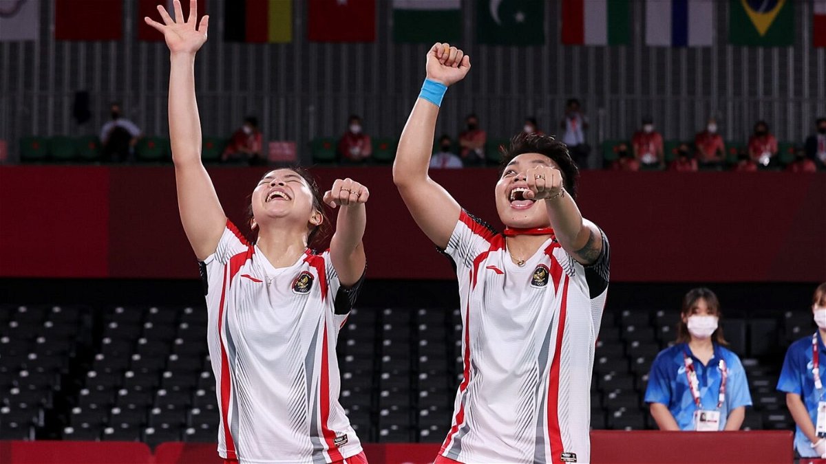 Greysia Polii(left) and Apriyani Rahayu of Indonesia celebrate as they win against Chen Qing Chen and Jia Yi Fan of China during the Women’s Doubles Gold Medal match on day ten of the Tokyo 2020 Olympics