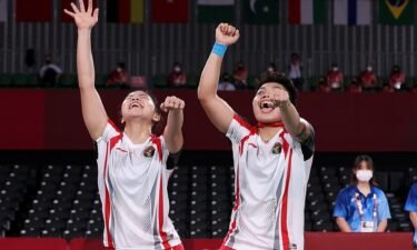 Greysia Polii(left) and Apriyani Rahayu of Indonesia celebrate as they win against Chen Qing Chen and Jia Yi Fan of China during the Women’s Doubles Gold Medal match on day ten of the Tokyo 2020 Olympics