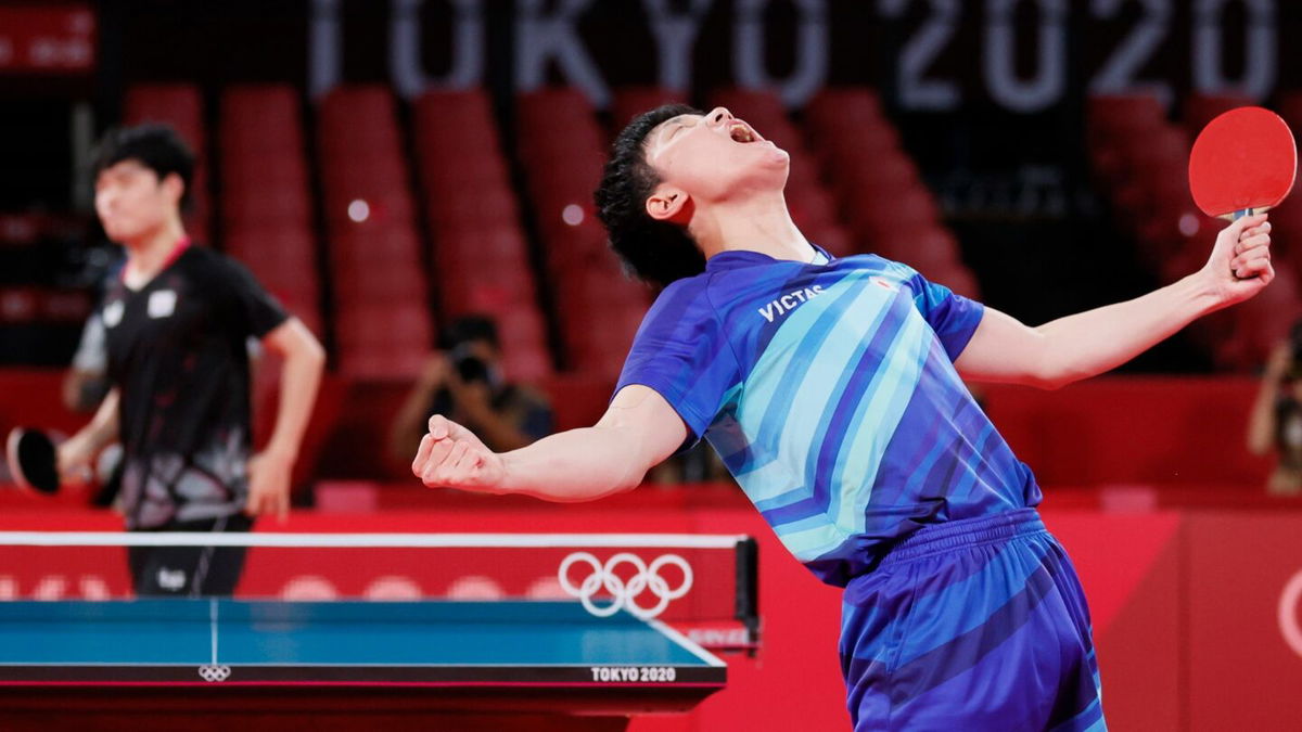 Harimoto Tomokazu of Japan screams to the heavens after winning a point