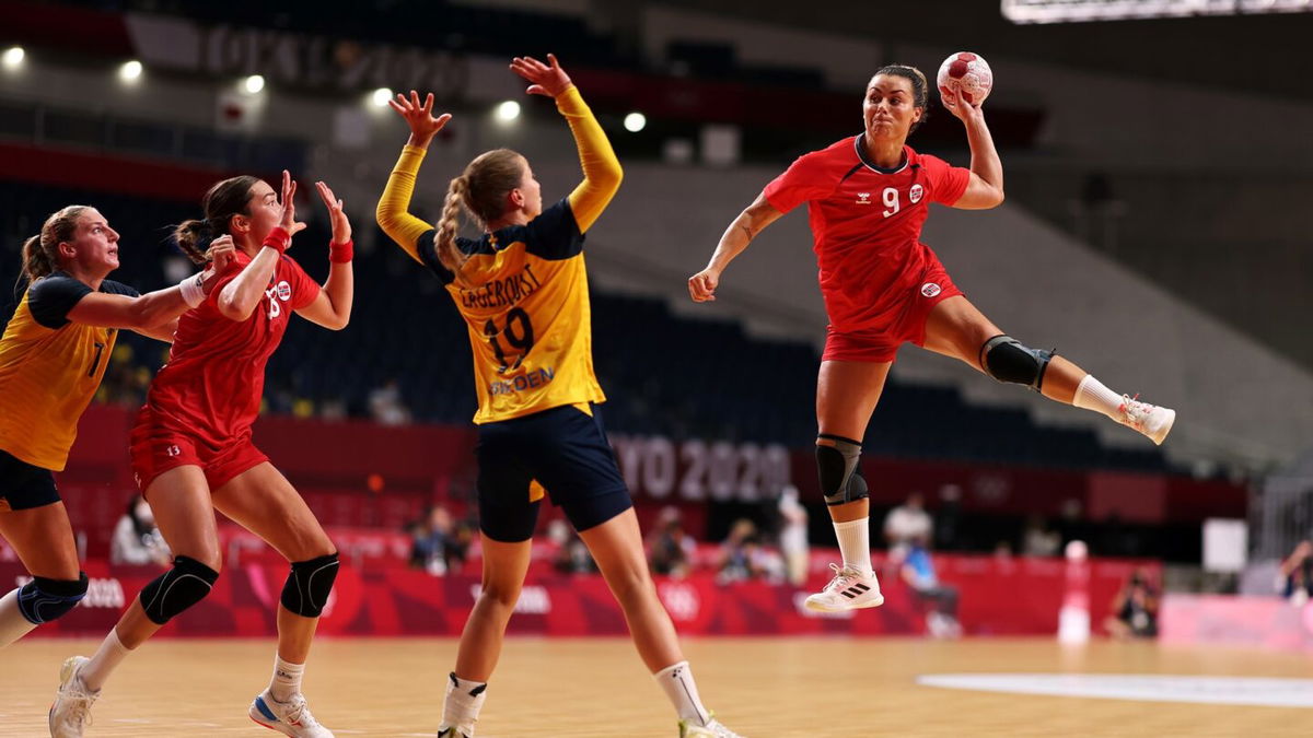 Nora Moerk goes airborne to fire a shot on Sweden's goal in the bronze medal match