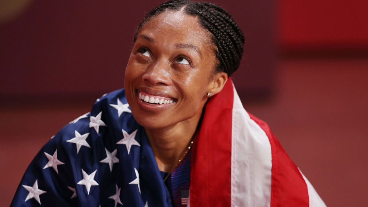 Allyson Felix celebrates after winning the bronze medal in the Women's 400m Final