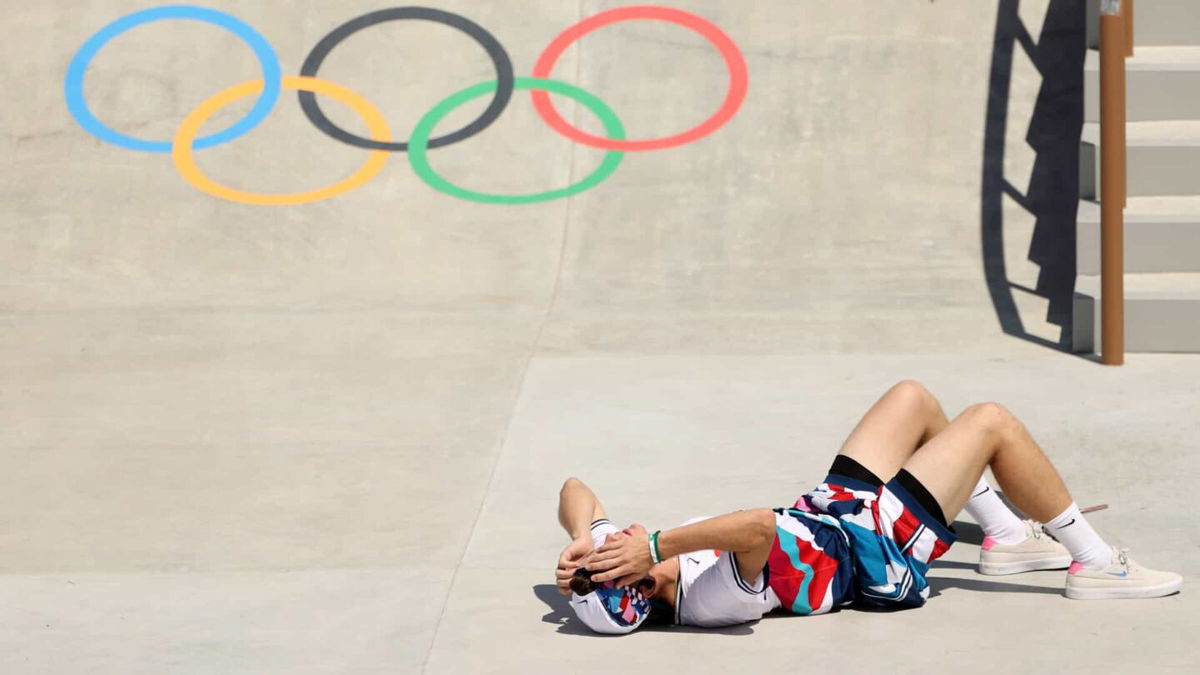 Team USA's Jake Ilardi reacts after falling as competes during skateboarding prelims in Tokyo.