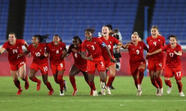 Canada celebrates its penalty shootout win over Sweden in the gold medal match.