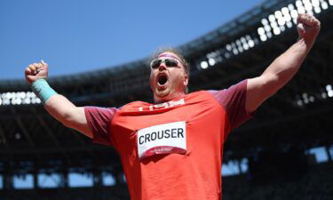 Ryan Crouser of Team United States celebrates as he wins the gold medal in the Men's Shot Put Final on day thirteen of the Tokyo 2020 Olympic Games