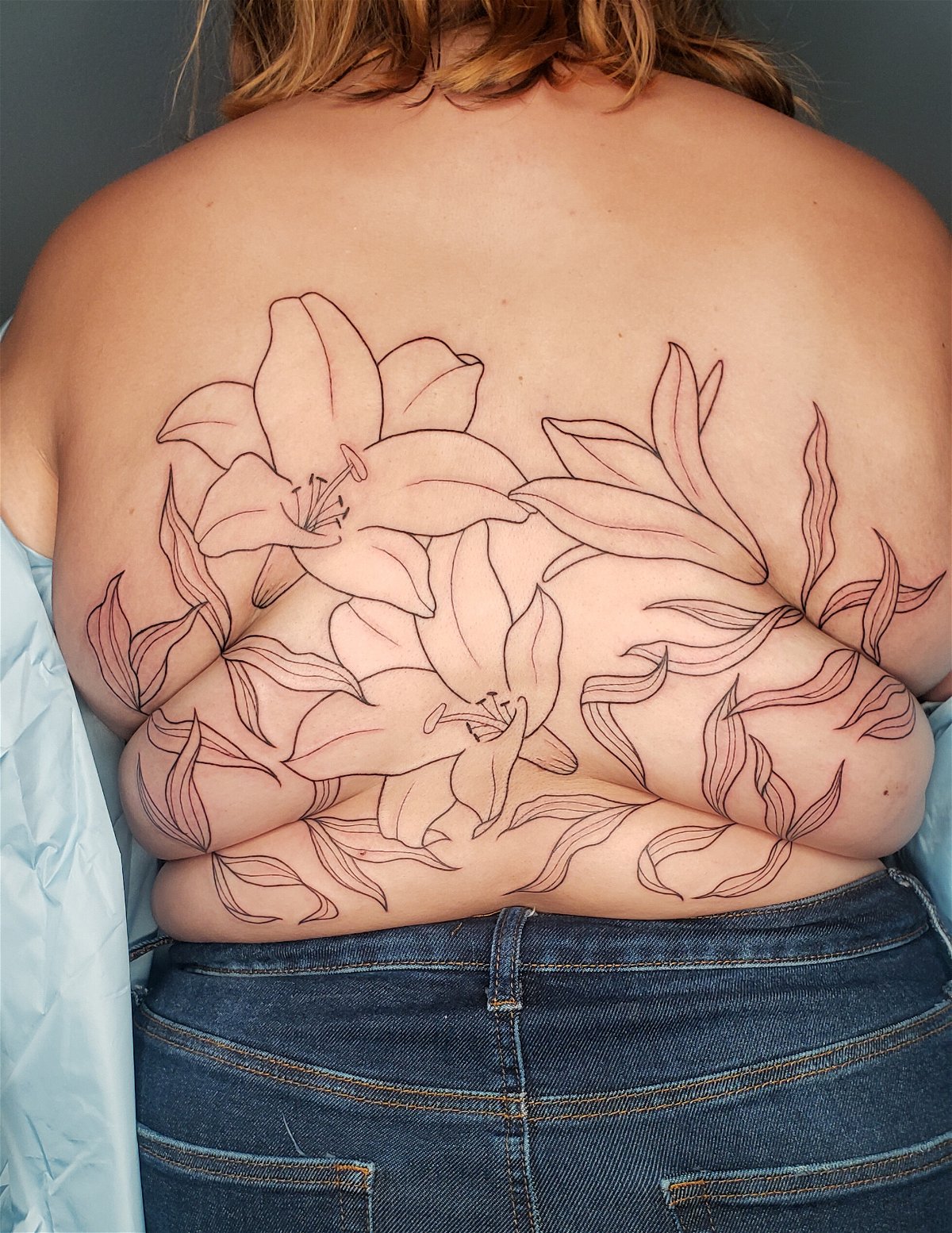 The tattooist creating body-positive 'roll flowers' - KTVZ