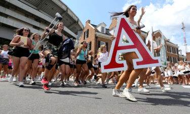 New sorority sisters run to their houses at the University of Alabama after receiving their bids on Aug. 15. The highs and heartbreaks of "RushTok" dominated TikTok this month.