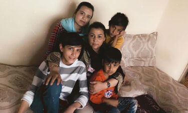 Suneeta hugs her children in this image taken earlier this year.