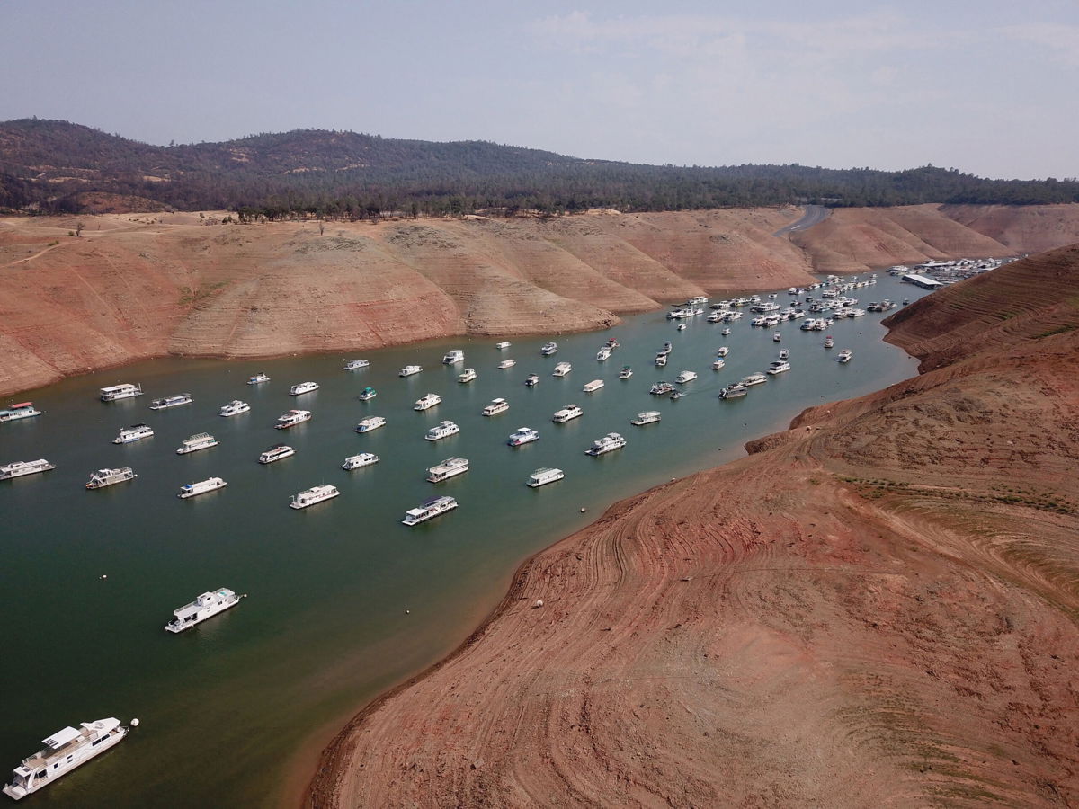 <i>Robyn Beck/AFP/Getty Images</i><br/>In this aerial photo houseboats sit in low water on Lake Oroville as California's drought emergency worsens