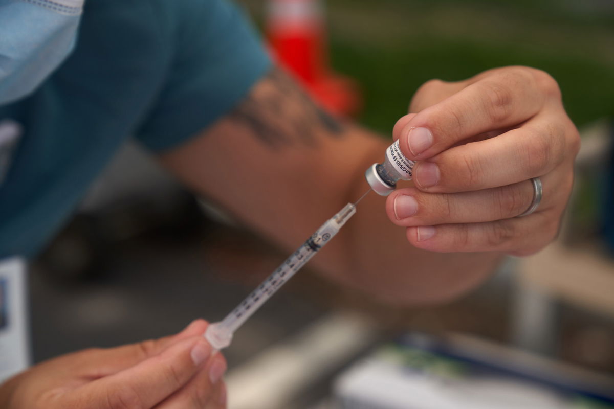 <i>Allison Dinner/Bloomberg/Getty Images</i><br/>Federal health officials say studies are showing that even vaccinated people are more likely to become infected now