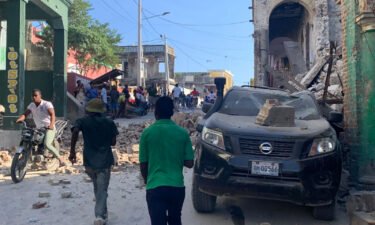 Buildings and cars were damaged in Les Cayes