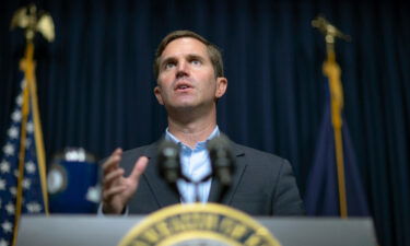 National Guard will be deployed across Kentucky to help overwhelmed hospitals. Kentucky Governor Andy Beshear here speaks during a media briefing in Frankfort