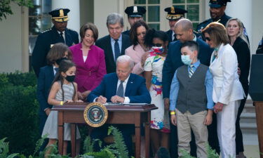 President Joe Biden signs a bill that awards Congressional gold medals to law enforcement officers that protected members of Congress at the Capitol during the January 6 riots.