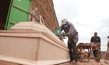 Kenya's coffin makers say the pandemic means they're busier than ever. Some still won't get vaccinated.