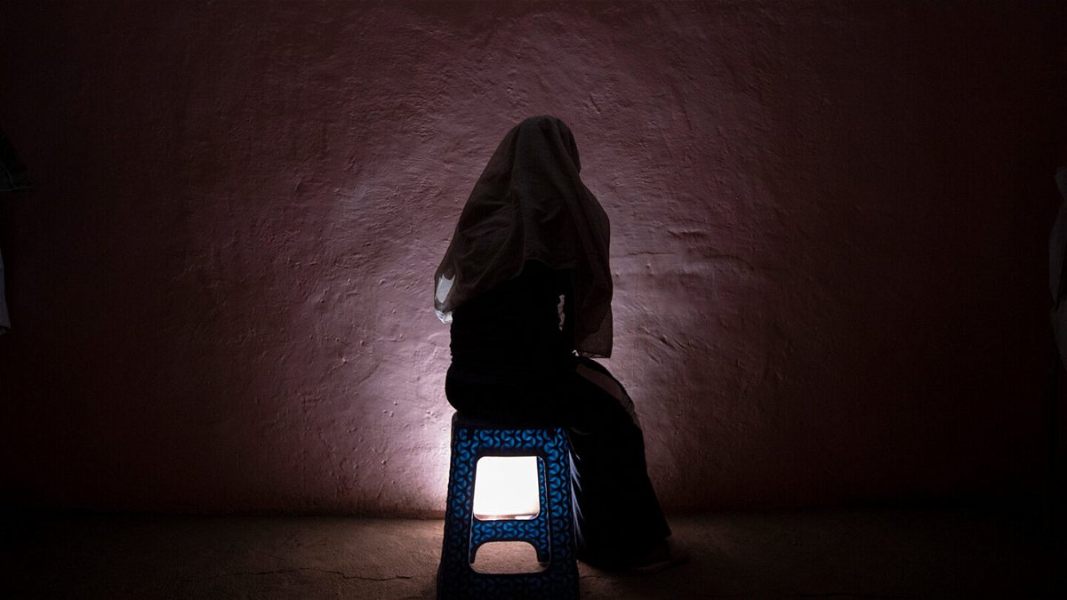 <i>Nariman El-Mofty/AP</i><br/>A Tigrayan refugee rape victim who fled the conflict in Ethiopia's Tigray sits for a portrait in eastern Sudan near the Sudan-Ethiopia border