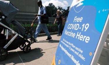 A city-operated mobile pharmacy advertises the Covid-19 vaccine in a New York City neighborhood on July 30.