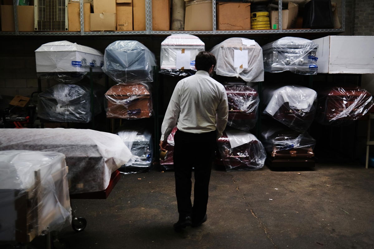 <i>Spencer Platt/Getty Images</i><br/>An inventory of pre-sold caskets at a funeral home in April 2020 in New York City.