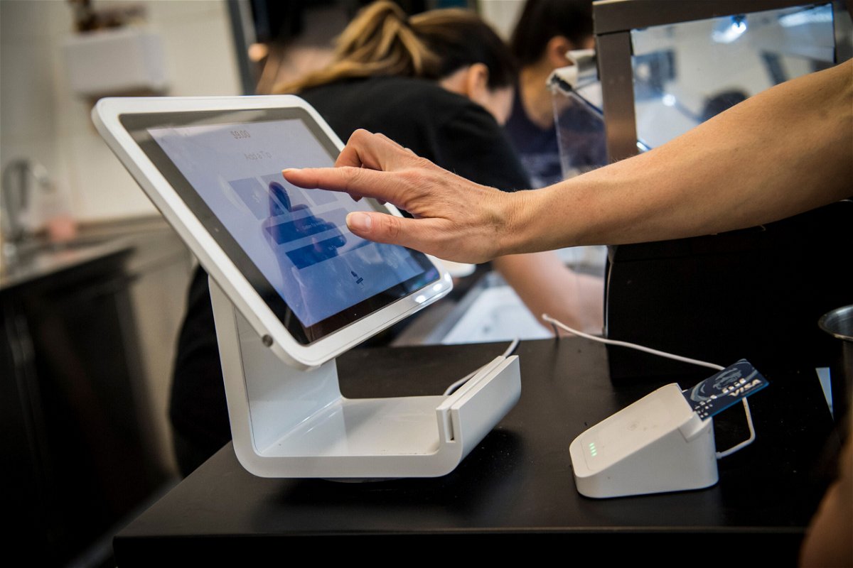 <i>David Paul Morris/Bloomberg via Getty Images</i><br/>Square anounced Sunday that it's buying Afterpay for $29 billion. A customer uses a Square Inc. device to make a payment in San Francisco