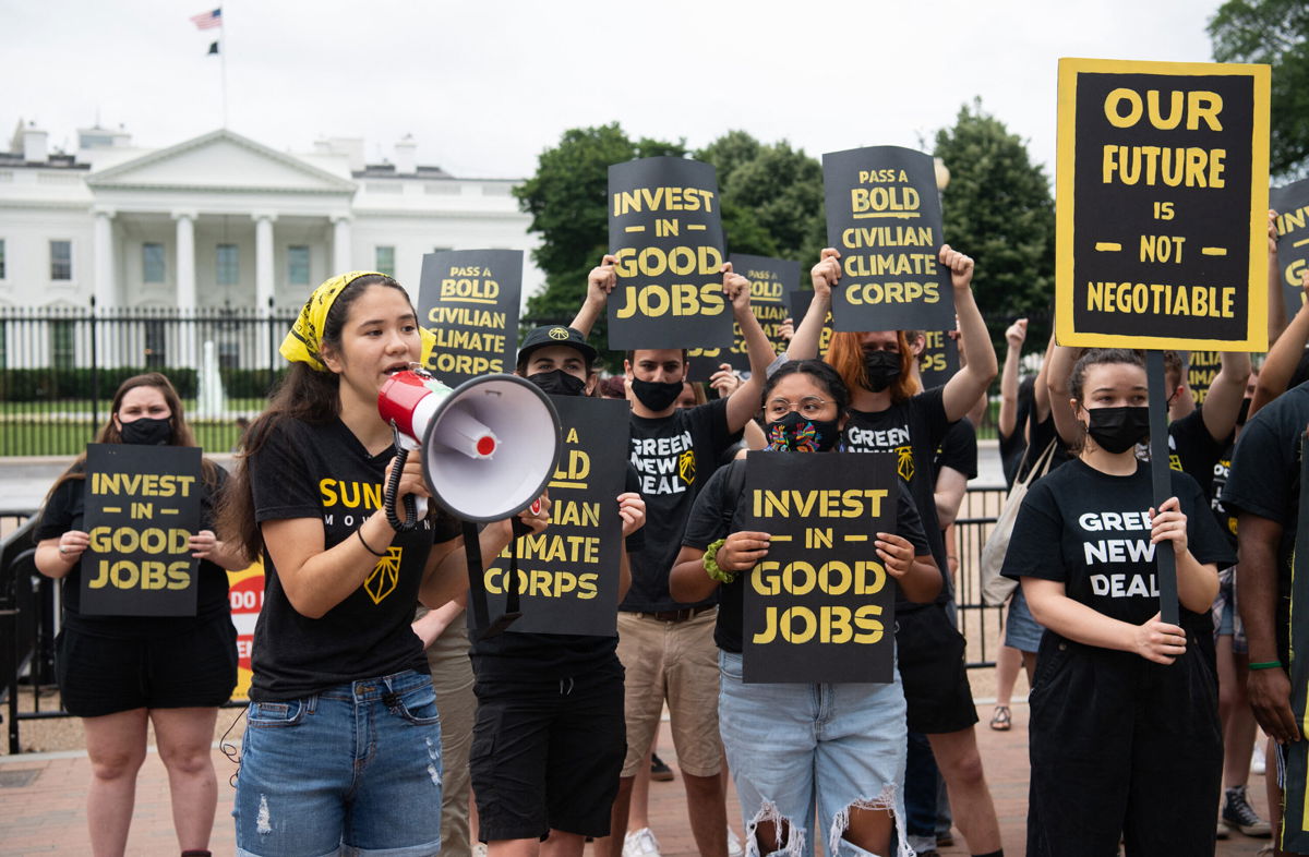 <i>Saul Loeb/AFP/Getty Images</i><br/>Advocacy groups are ratcheting up the pressure on lawmakers during Congress's August recess to pass bold climate provisions in an upcoming budget reconciliation bill.