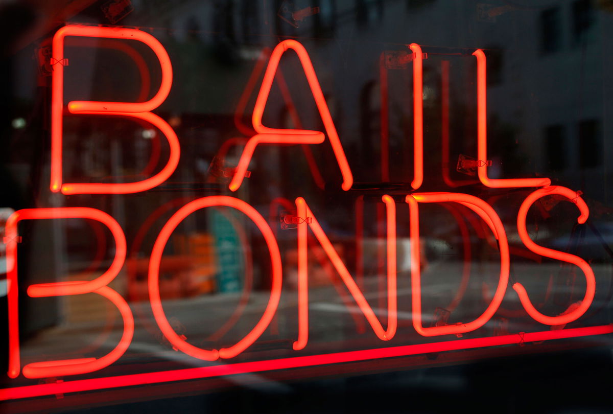 <i>Kathy Willens/AP</i><br/>FILE - This file photo shows a sign advertising a bail bonds business in the Brooklyn borough of New York.
