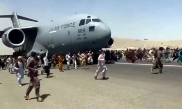 The Biden administration faces daunting challenges to evacuate thousands of Americans and Afghans in 2 weeks. Afghans here run alongside a US transport plane leaving Kabul international airport