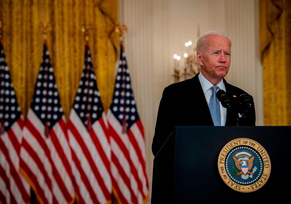 <i>Bill O'Leary/Washington Post/Getty Images</i><br/>President Joe Biden delivers remarks on the situation in Afghanistan in the East Room of the White House