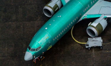 The Federal Aviation Administration is investigating whether Boeing employees are being pressured on safety issues. A Boeing 737 Max airplane here sits parked at the company's production facility on November 18