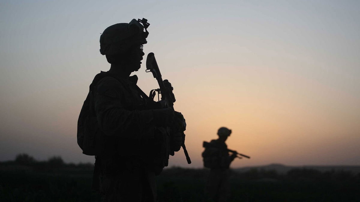 <i>Joe Raedle/Getty Images</i><br/>US Marines patrol Afghanistan's Herat province in 2009. The Taliban's takeover of Afghanistan is particularly disheartening to Americans who fought there. Across 20 years of combat