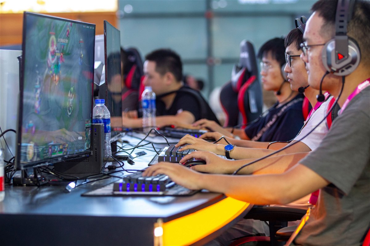 <i>Visual China Group/Getty Images</i><br/>China bans kids from playing online video games during the week. Pictured are gamers at the Shanghai New International Expo Center on Aug. 1