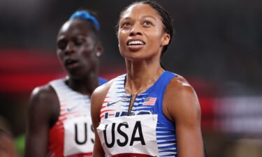 Allyson Felix reacts after winning the gold medal in the women' s 4 x 400m relay final at Tokyo 2020.