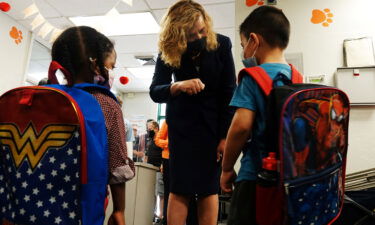 Broward and Alachua counties in Florida must allow mask opt-out or start losing funding. Broward County Schools Interim Superintendent Dr. Vickie L. Cartwright here greets students Wednesday