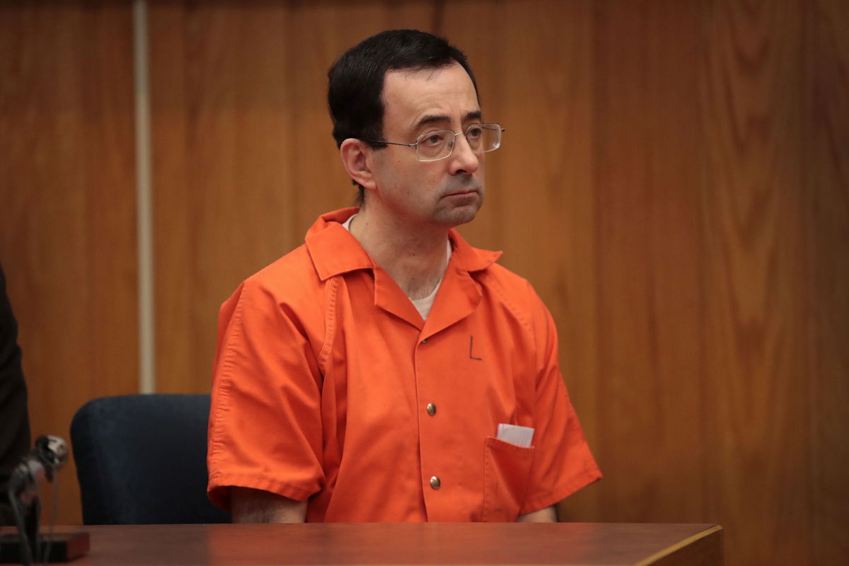 <i>Scott Olson/Getty Images</i><br/>A judge has ordered that Larry Nassar's prison funds be turned over to victim restitution. Nassar is seen here in Eaton County Circuit Court on February 5