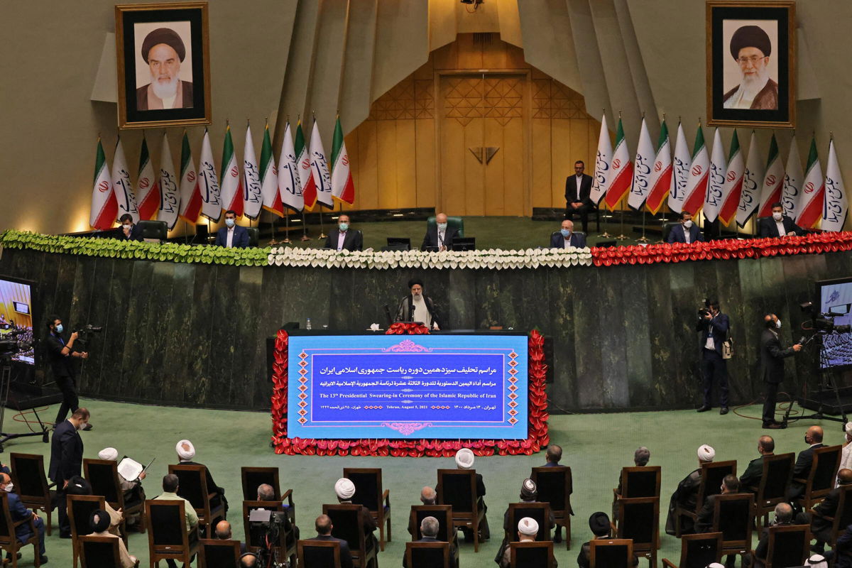 <i>Atta Kenare/AFP/Getty Images</i><br/>Iran's newly elected President Ebrahim Raisi speaks at his swearing in ceremony at the Iranian parliament in the capital Tehran on August 5.