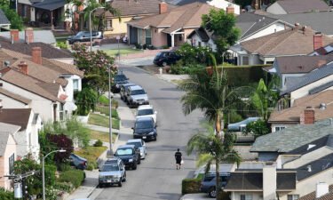 The US household debt soared to nearly $15 trillion last quarter. This image shows a Los Angeles neighborhood on July 30.