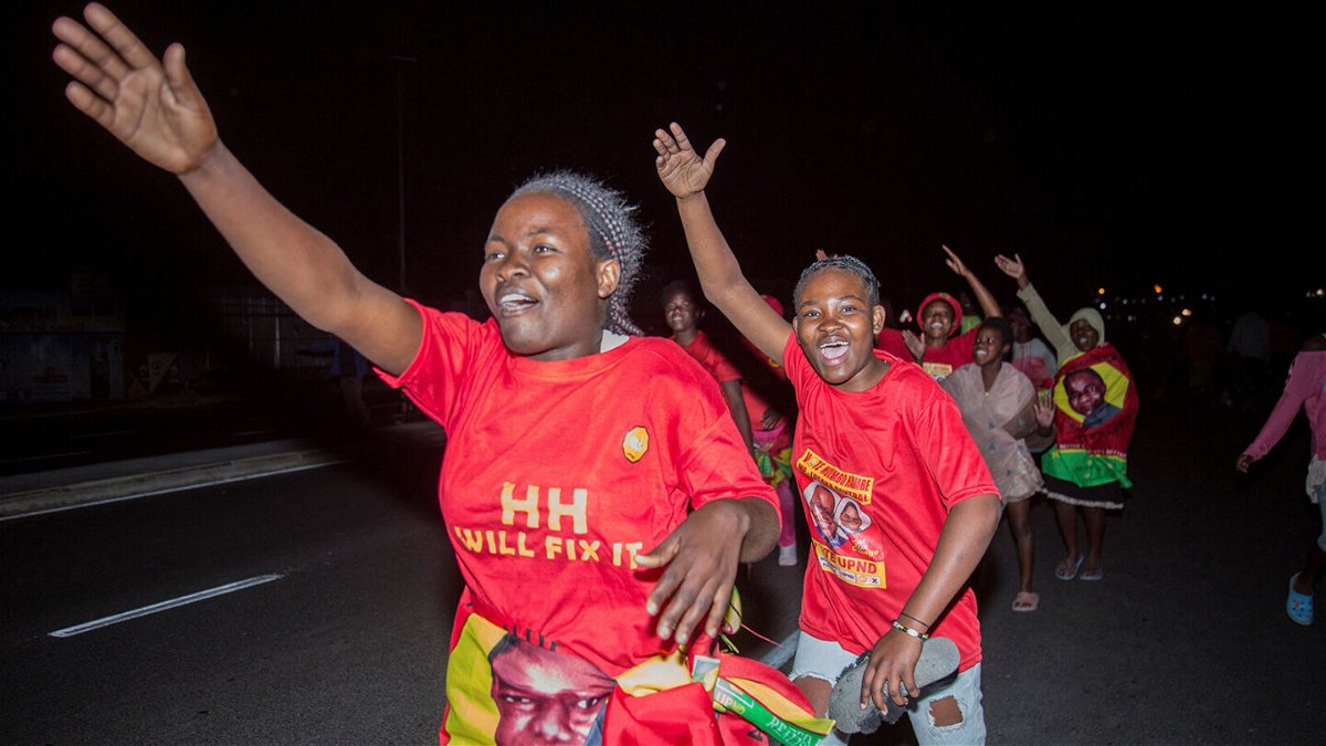 <i>Salim Dawood/AFP/Getty Images</i><br/>Supporters of Zambian president-elect Hakainde Hichilema celebrate his victory