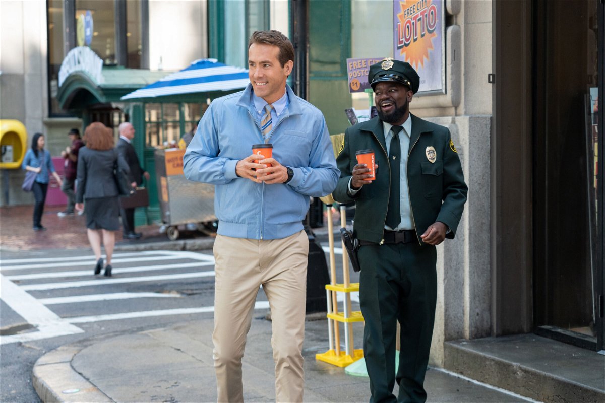 <i>Alan Markfield/Twentieth Century Fox</i><br/>Actor Ryan Reynolds (right) is seen here as Guy and Lil Rel Howery as Buddy in 