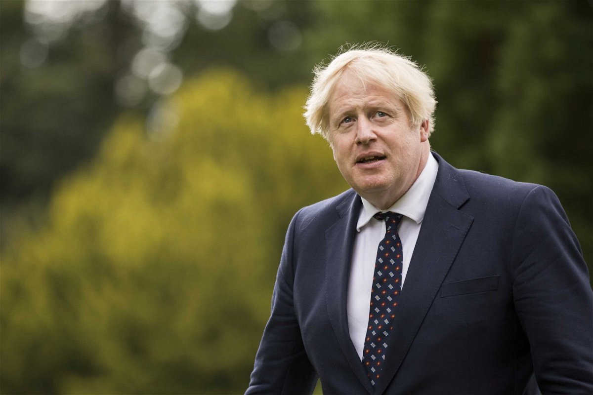 <i>James Glossop/POOL/AFP/Getty Images</i><br/>British Prime Minister Boris Johnson continued a tour of Scotland after a member of his team tested positive for Covid-19. Johnson here visits the Scottish Police College at Tulliallan near Kincardine