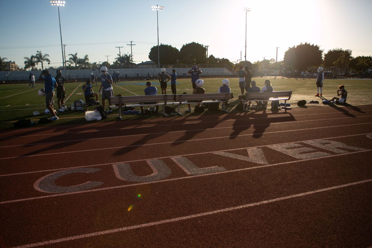 <i>Jason Armond/Los Angeles Times/Shutterstock</i><br/>Culver City High School holds its first official football practice in February following an 11-month shutdown due to Covid-19. Culver City Unified School District plans to require all eligible students aged 12 and older to be vaccinated against Covid-19 by mid-November.