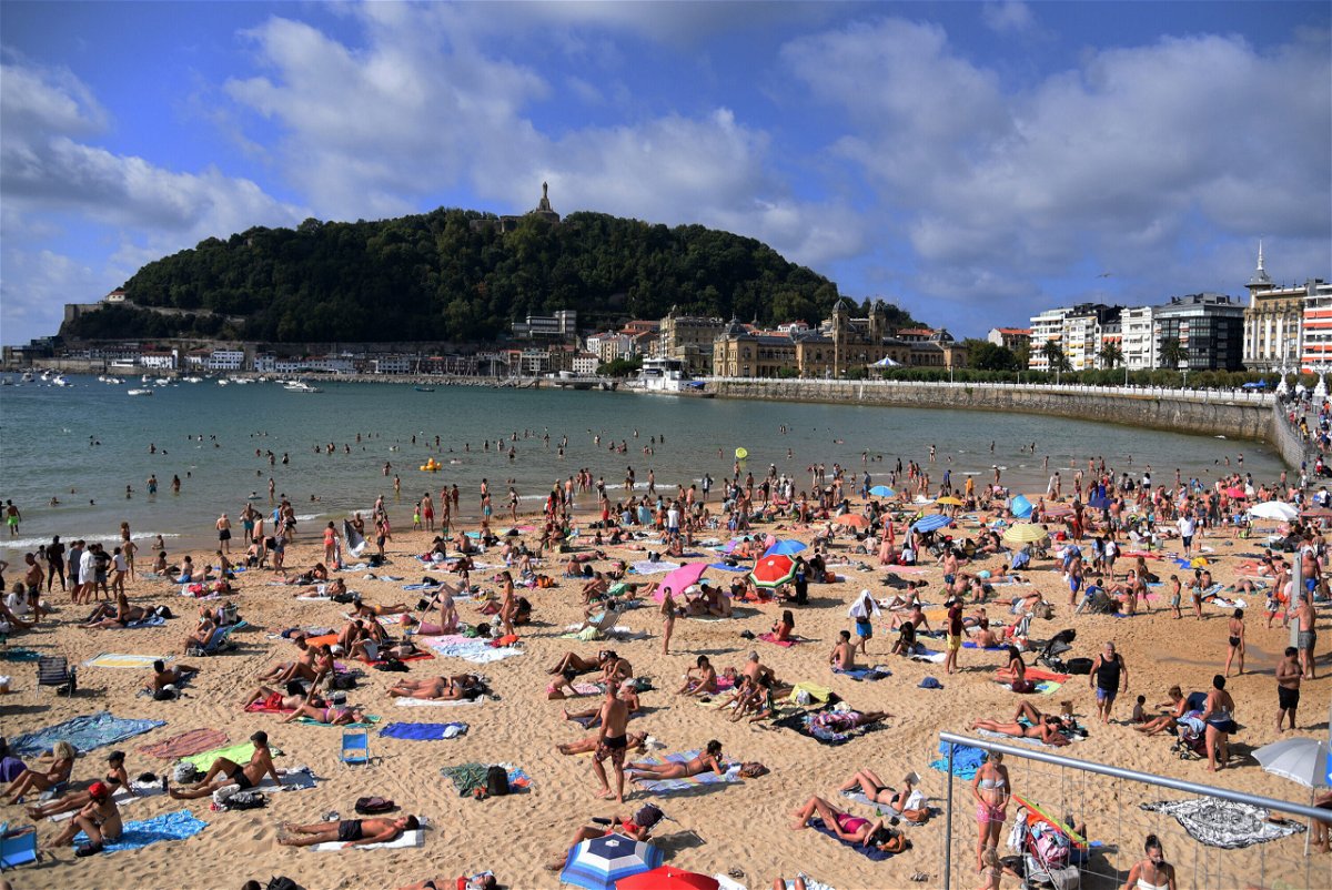 <i>Ramon Costa/SOPA Images/LightRocket/Getty Images</i><br/>The European Union is expected to recommend on Monday that member states reinstate Covid-related travel restrictions and halt nonessential travel from the United States and five other countries. People are seen here at the Beach of the Concha in San Sebastian Guipuzkoa
