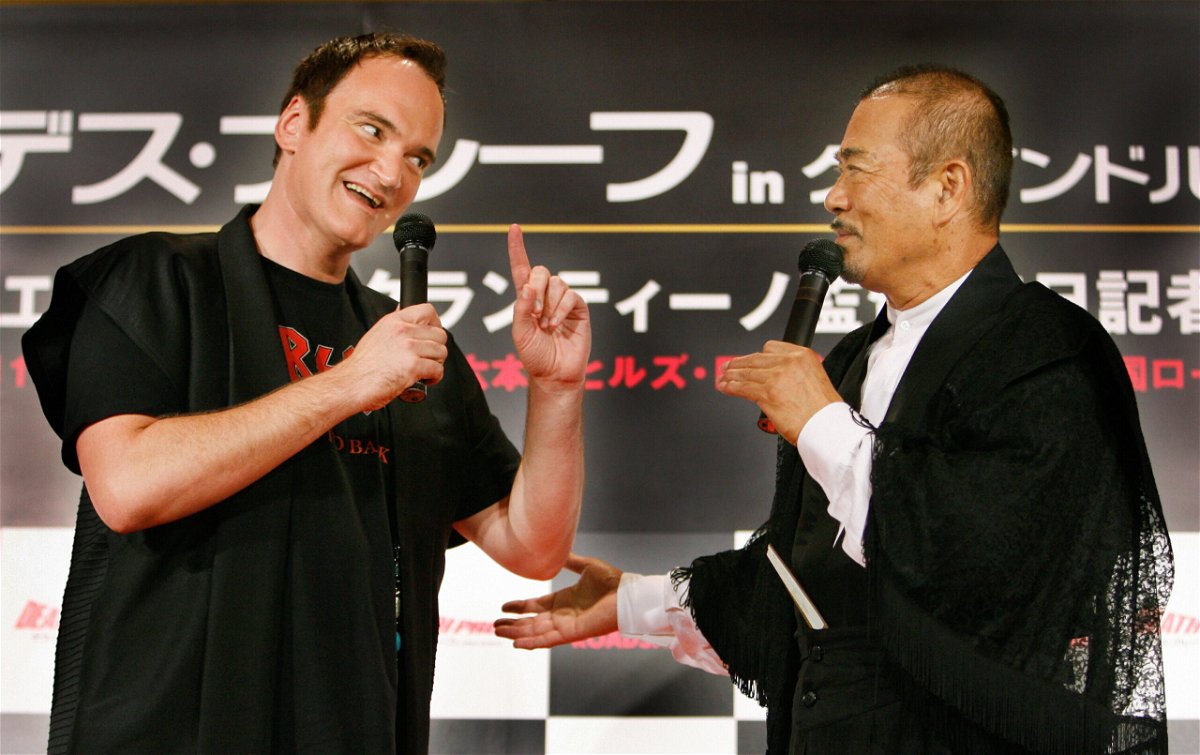 <i>Toru Yamanaka/AFP/Getty Images</i><br/>Quentin Tarantino (left) sang Chiba's praises in his films.