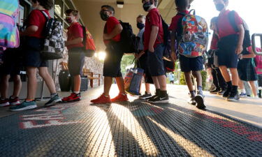 The Supreme Court of Texas allowed Thursday local mask mandates in Texas. Elementary school students here line up to enter school for the first day of classes in Richardson