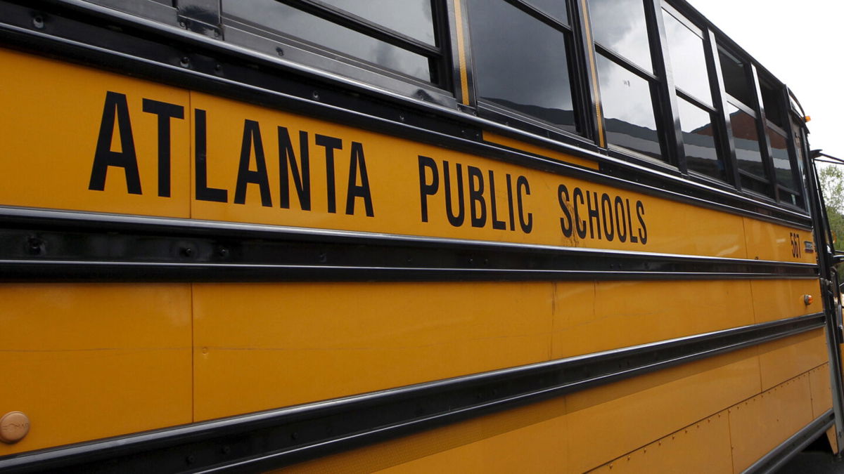 <i>Tami Chappell/Reuters</i><br/>An Atlanta Public Schools bus is parked at Dobbs Elementary School in Atlanta