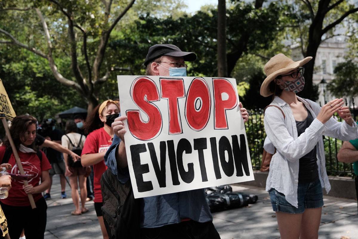 <i>Spencer Platt/Getty Images</i><br/>Activists hold a protest against evictions near City Hall on August 11 in New York City.