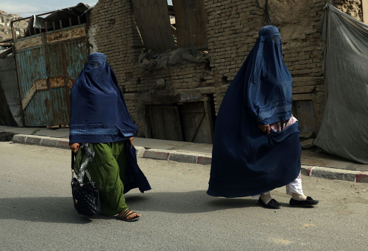 <i>Rahmat Gul/AP</i><br/>The World Bank announced it is halting financial support to Afghanistan amid worries about the fate of women under Taliban rule