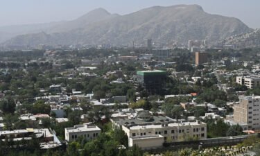 This picture taken from the top of a hillside shows a general view of the Kabul city on August 15. News outlets including CNN and the Washington Post are working overtime to ensure the safety of staffers in Afghanistan after the Taliban took control of the country.