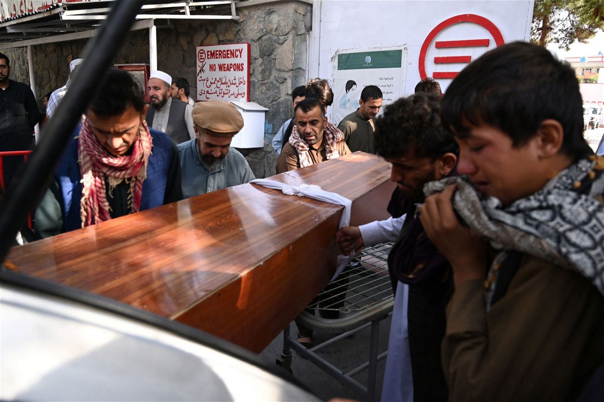<i>Aamir Qureshi/AFP/Getty Images</i><br/>Relatives load in a car the coffin of a victim of the August 26th suicide attack