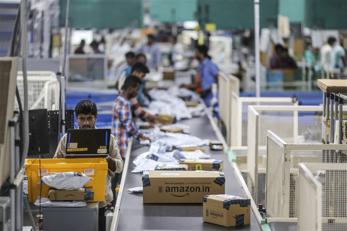 <i>Dhiraj Singh/Bloomberg/Getty Images</i><br/>Amazon Friday scored a major win in the battle for India's retail market. This image shows an Amazon.com fulfillment center in Hyderabad