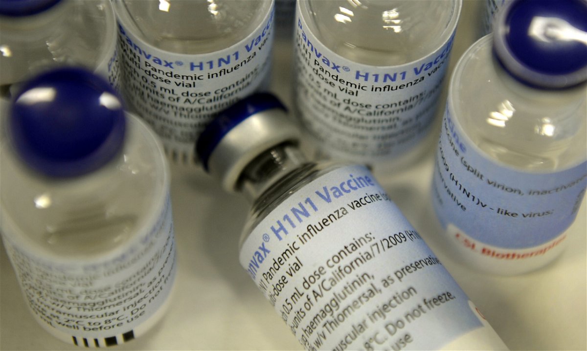 <i>WILLIAM WEST/AFP/AFP via Getty Images</i><br/>Vials of H1N1 vaccine by manufacturer CSL are displayed near its production line in Melbourne on September 24